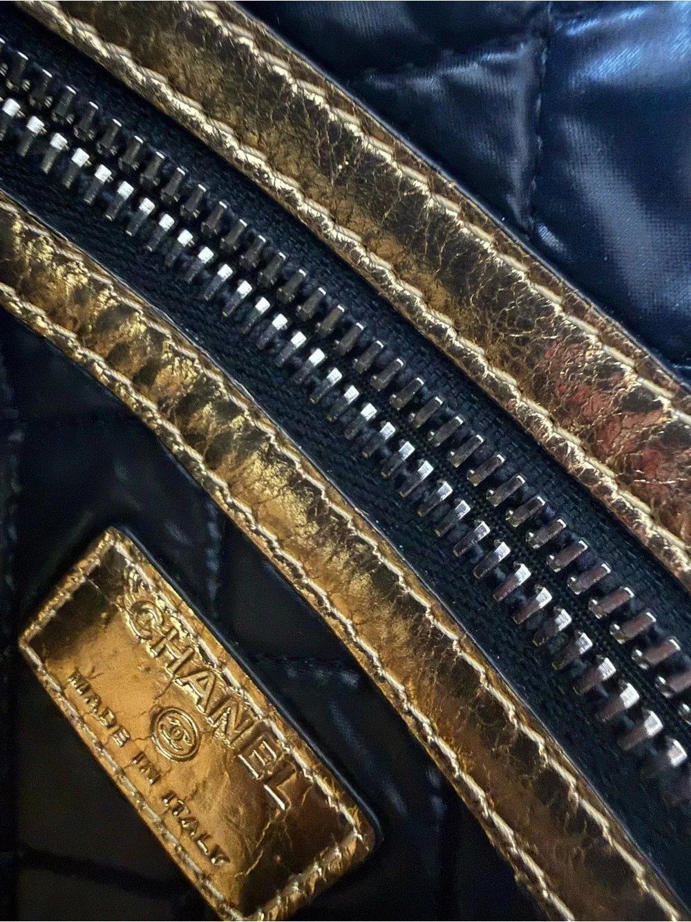 CHANEL Metallic Gold and Black Quilted Leather Pouch